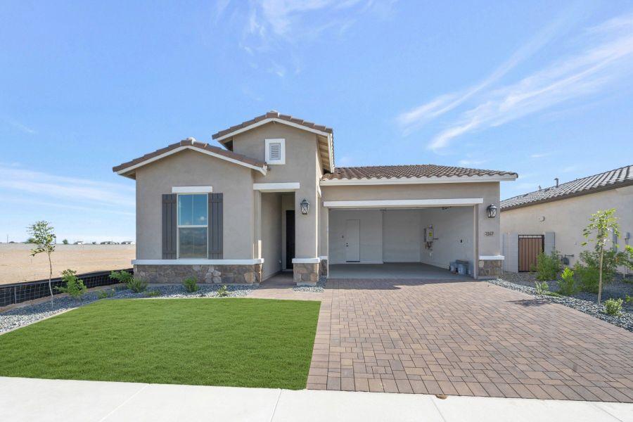 Front exterior of a new home in Artesa at Soleo, San Tan Valley, AZ, highlighting curb appeal (Image 2).