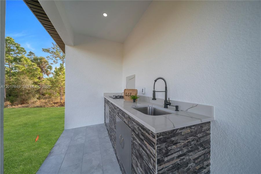 Exterior details and patio area of a home in , Lehigh Acres (Image 30).