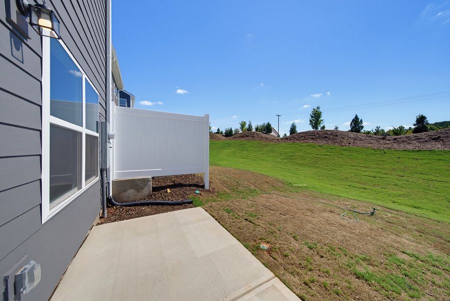 Exterior details and patio area of a home in Sweetbrier, Durham (Image 3).