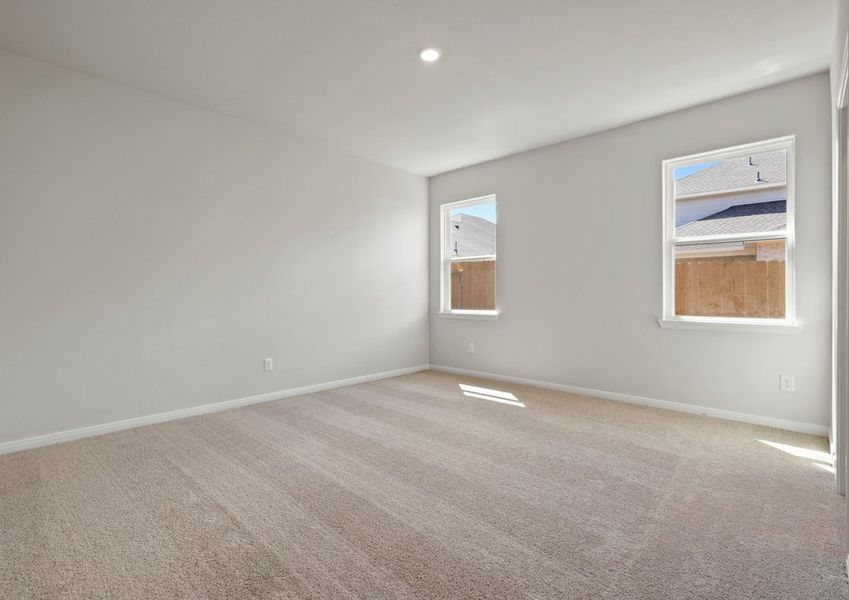 Master bedroom with lush carpet Master bedroom with lush carpet