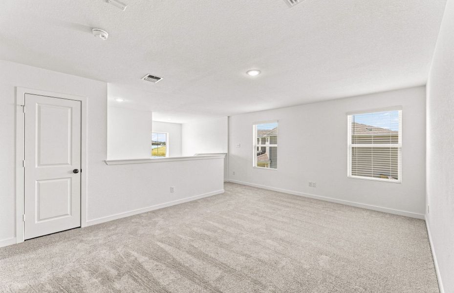 Spacious, unfurnished interior of a new home in Sonterra, Jarrell (Image 35).