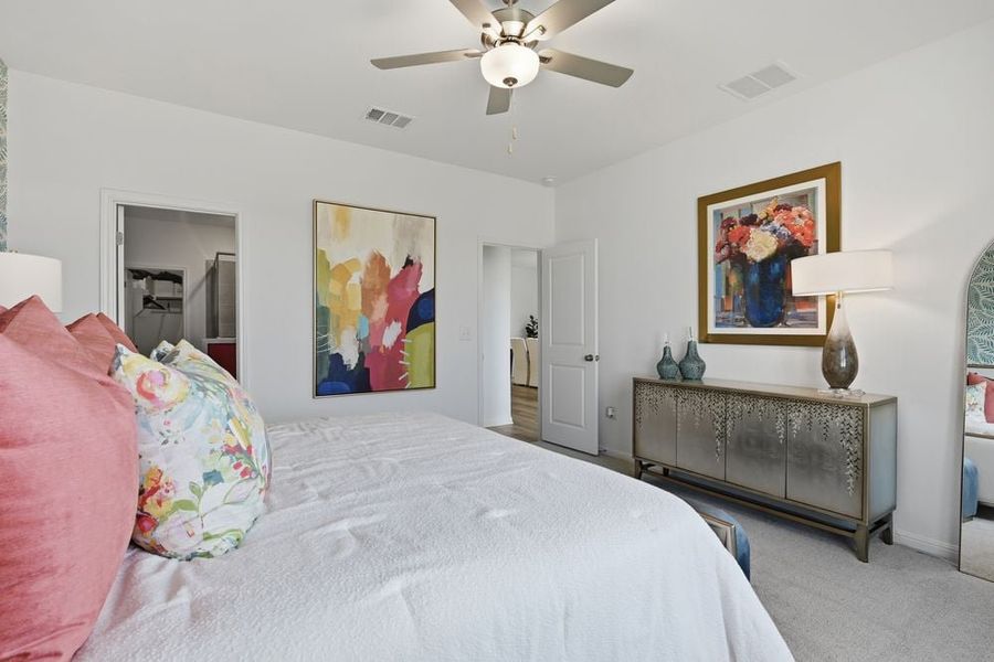 Representative furnished interior of a home built from the Hawk by Taylor Morrison in Longview 40s, Del Valle (Image 16).