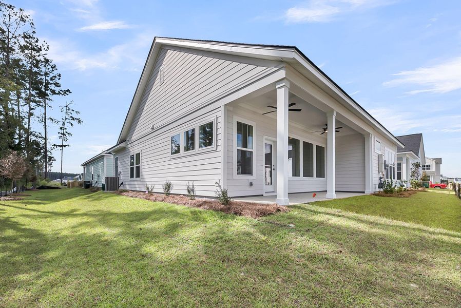 Exterior details and patio area of a home in Nexton – Midtown – The Garden Collection, Summerville (Image 24).