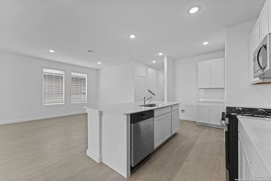 Furnished interior view inside a new home in Voss Farms, New Braunfels (Image 8).