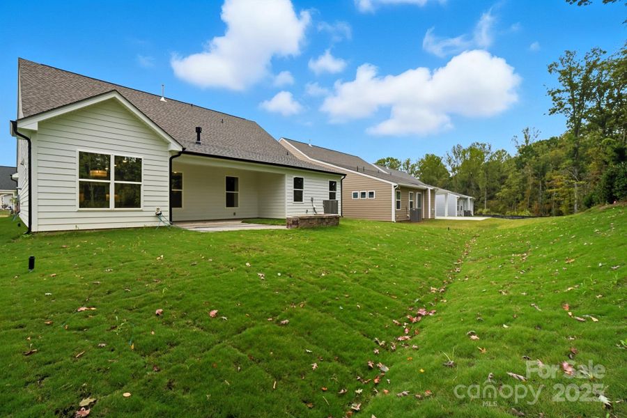 Exterior details and patio area of a home in Heritage - 55+ Community, Indian Trail (Image 1). Exterior details and patio area of a home in Heritage - 55+ Community, Indian Trail (Image 1).