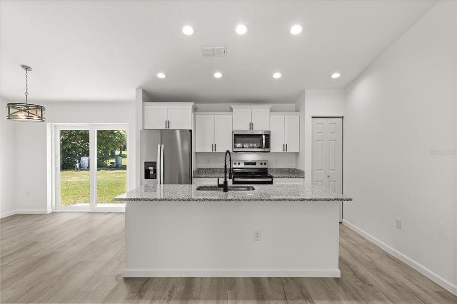 Furnished interior view inside a new home in , Dunnellon (Image 4).