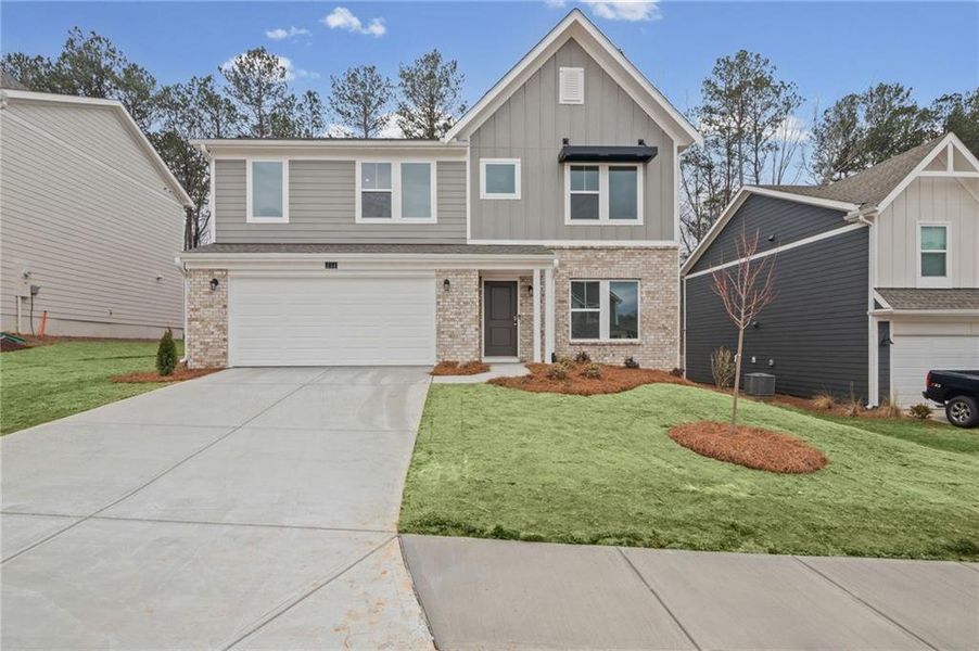 Front exterior of a new home in Sage Woods, Dallas, GA, highlighting curb appeal (Image 20).