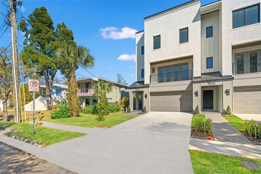 Front exterior of a new home in , Tampa, FL, highlighting curb appeal (Image 28).