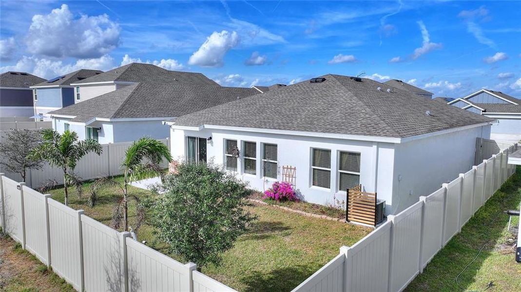 Exterior details and patio area of a home in Lawson Dunes: Estate Collection, Haines City (Image 22).
