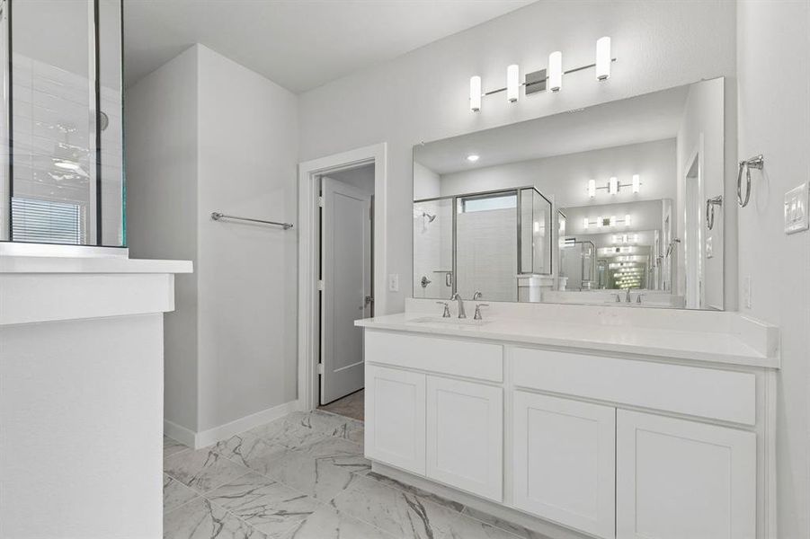 Primary Bathroom in the Winters home plan by Trophy Signature Homes – REPRESENTATIVE PHOTO Primary Bathroom in the Winters home plan by Trophy Signature Homes – REPRESENTATIVE PHOTO