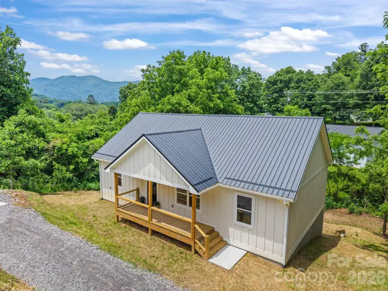 Exterior details and patio area of a home in , Waynesville (Image 27).