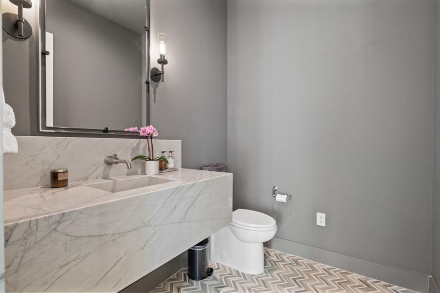 Bathroom featuring vanity and toilet Bathroom featuring vanity and toilet