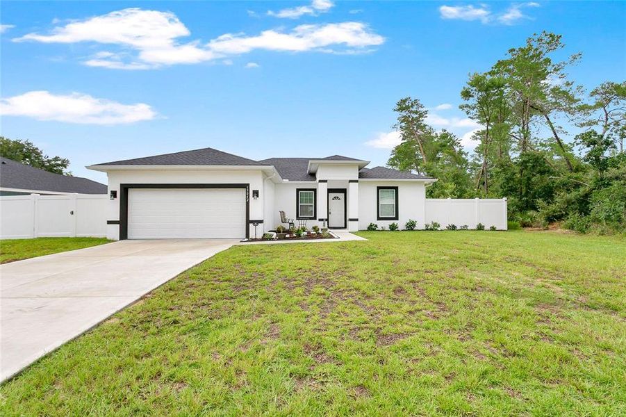 Front exterior of a new home in , Ocala, FL, highlighting curb appeal (Image 21).