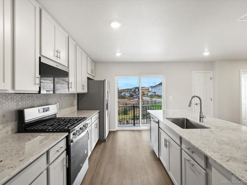 Furnished interior view inside a new home in Three Hills, Morrison (Image 8).