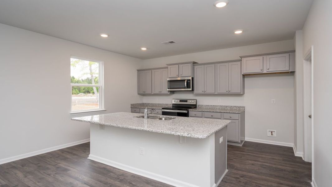 Representative furnished interior of a home built from the GALEN by D.R. Horton in Island Green, Myrtle Beach (Image 6).