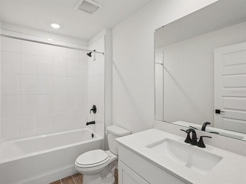 Furnished interior view inside a new home in Two Rivers - Signature Series, Zephyrhills (Image 16).