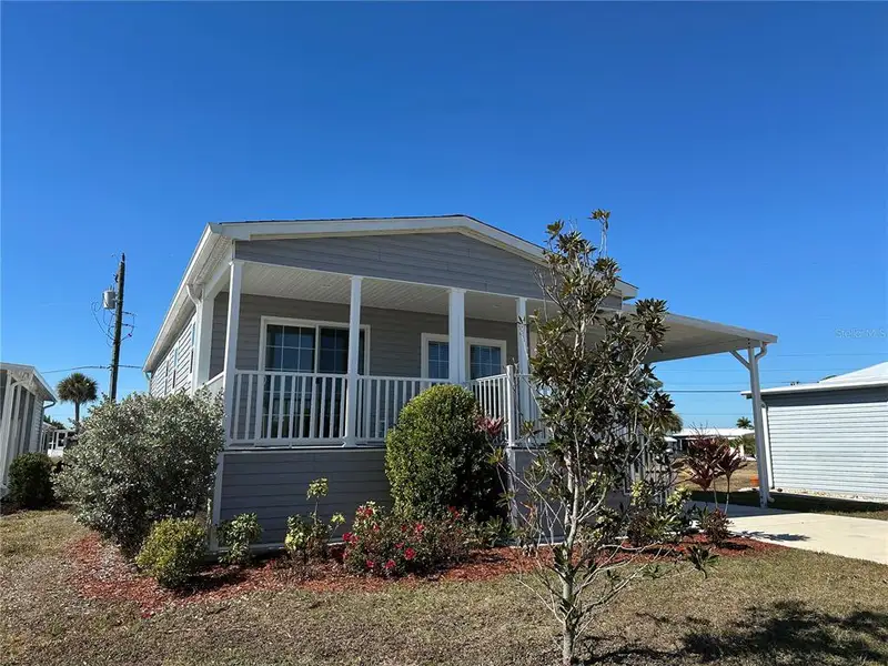 Exterior details and patio area of a home in , North Port (Image 2). Exterior details and patio area of a home in , North Port (Image 2).