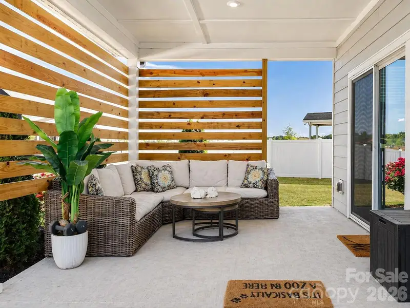 Exterior details and patio area of a home in Wilson Creek Executive Series, Indian Land (Image 22).