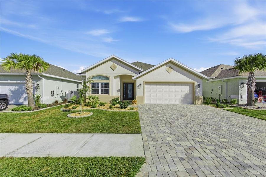 Front exterior of a new home in , Palm Coast, FL, highlighting curb appeal (Image 2).