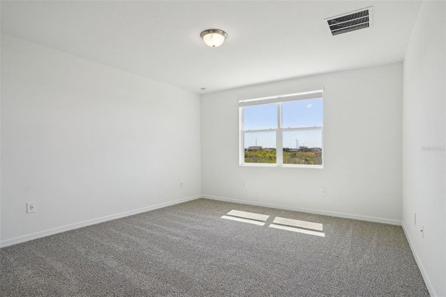 Spacious, unfurnished interior of a new home in Lake Deer Estates - Signature Series, Poinciana (Image 21). Spacious, unfurnished interior of a new home in Lake Deer Estates - Signature Series, Poinciana (Image 21).