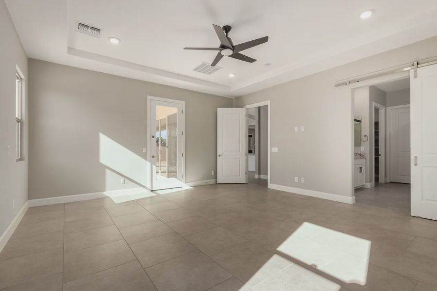 Spacious, unfurnished interior of a new home in Bellero Estates, Queen Creek (Image 30).