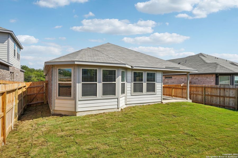 Front exterior of a new home in Comanche Ridge, San Antonio, TX, highlighting curb appeal (Image 27).