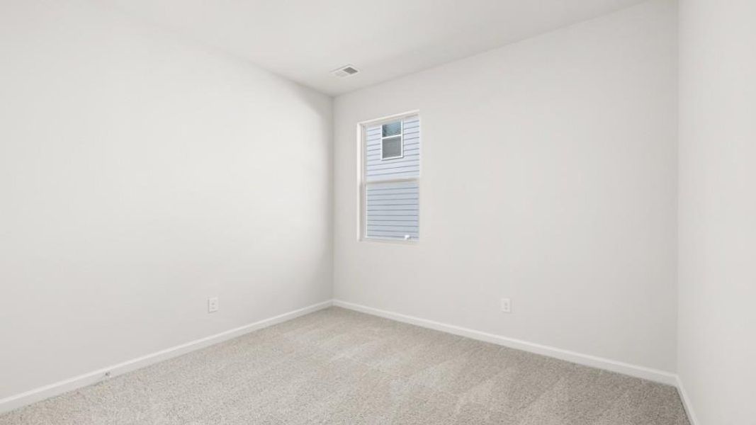 Spacious, unfurnished interior of a new home in South Wind, Fairburn (Image 17).