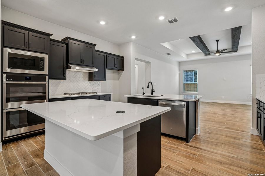 Furnished interior view inside a new home in Village at Three Oaks, Seguin (Image 5).