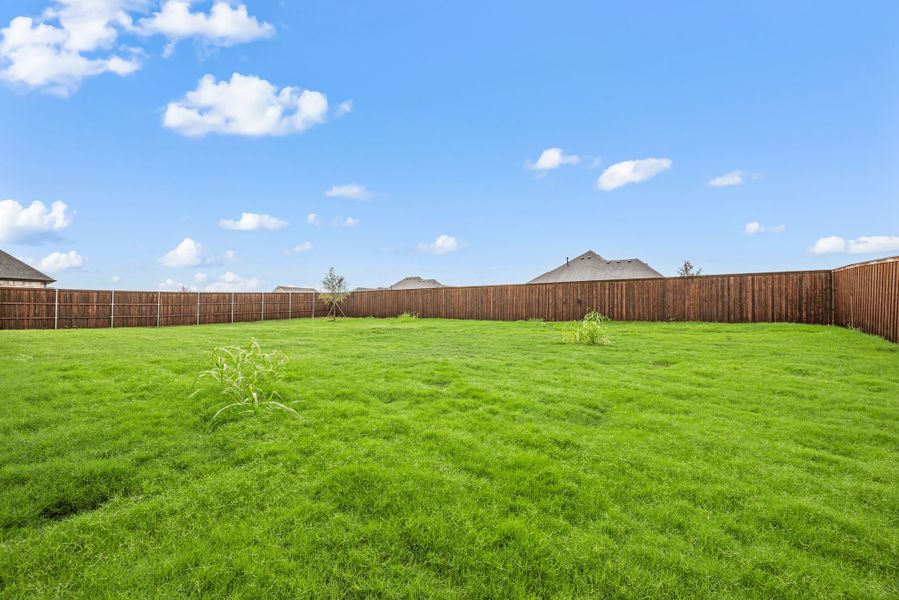 Exterior details and patio area of a home in NorthGlen, Haslet (Image 24).
