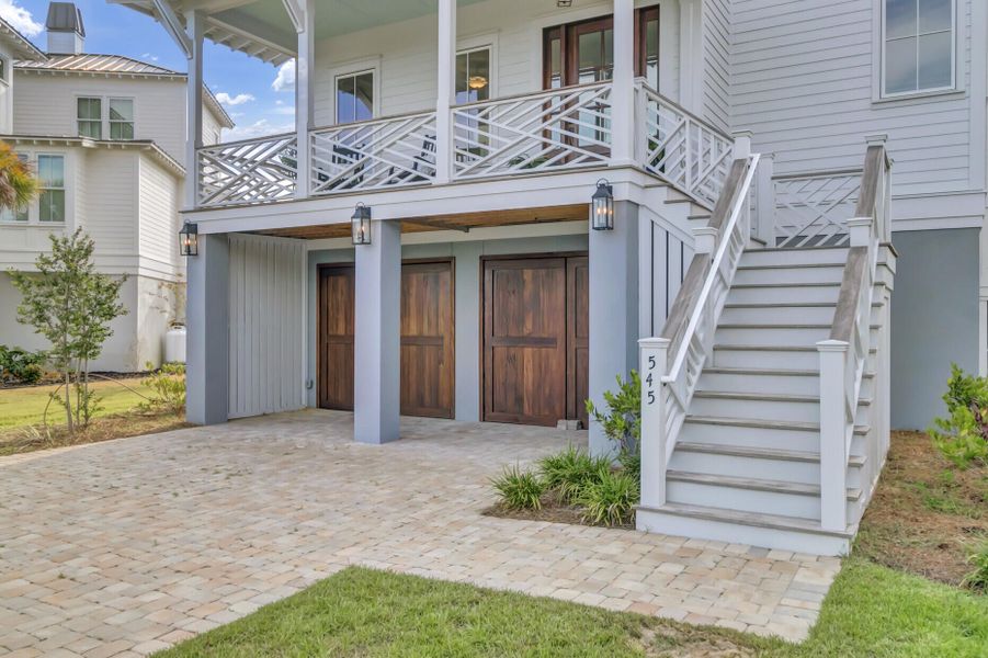 Exterior details and patio area of a home in , Johns Island (Image 35).