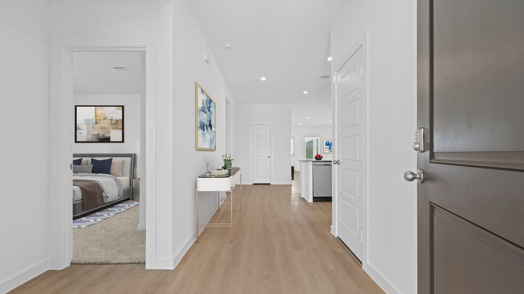 Representative furnished interior of a home built from the Kingston by D.R. Horton in Watermark, Alvin (Image 4).