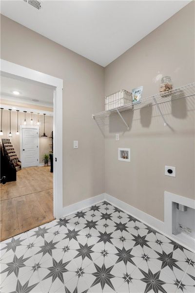Laundry Room. Staged for photography—furniture and décor not included