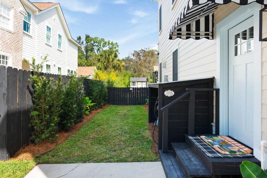 Exterior details and patio area of a home in , Charleston (Image 34).