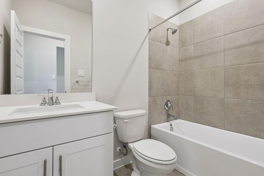 Furnished interior view inside a new home in Landing Meadows - Premier Series, New Caney (Image 6). Furnished interior view inside a new home in Landing Meadows - Premier Series, New Caney (Image 6).