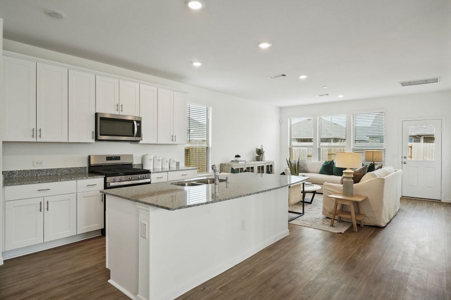 Representative furnished interior of a home built from the Holden by Pulte Homes in Ellerden, Tomball (Image 3).