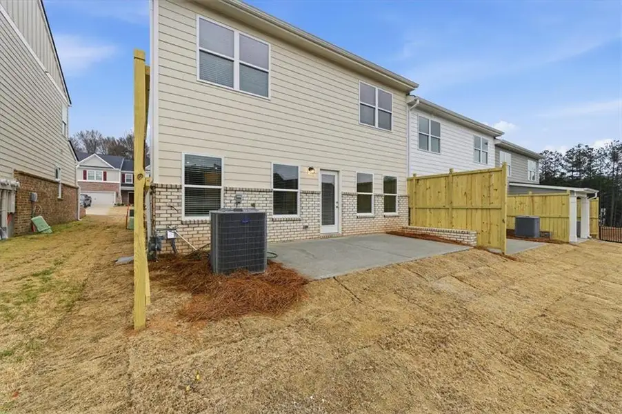 Exterior details and patio area of a home in Park Center Pointe, Mableton (Image 3).