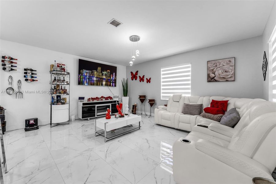 Furnished interior view inside a new home in , Homestead (Image 10). Furnished interior view inside a new home in , Homestead (Image 10).