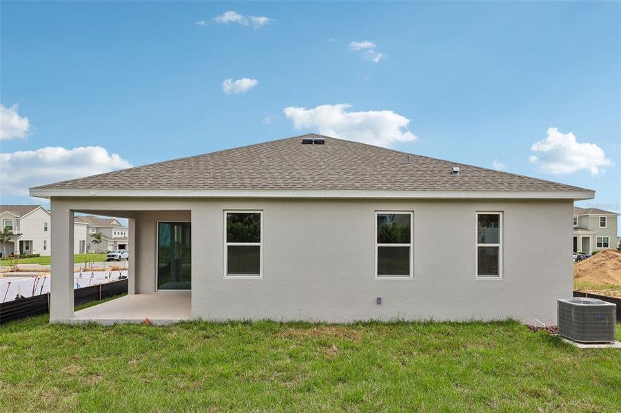 Exterior details and patio area of a home in Park View at the Hills, Minneola (Image 3). Exterior details and patio area of a home in Park View at the Hills, Minneola (Image 3).