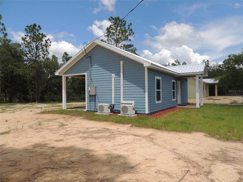 Exterior details and patio area of a home in , Williston (Image 17).