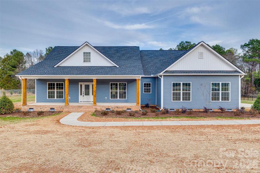 Front exterior of a new home in , Fort Lawn, SC, highlighting curb appeal (Image 1). Front exterior of a new home in , Fort Lawn, SC, highlighting curb appeal (Image 1).