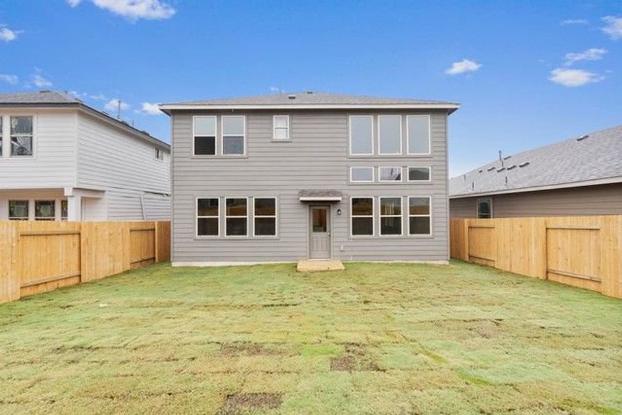 Front exterior of a new home in Morningstar, Georgetown, TX, highlighting curb appeal (Image 9).