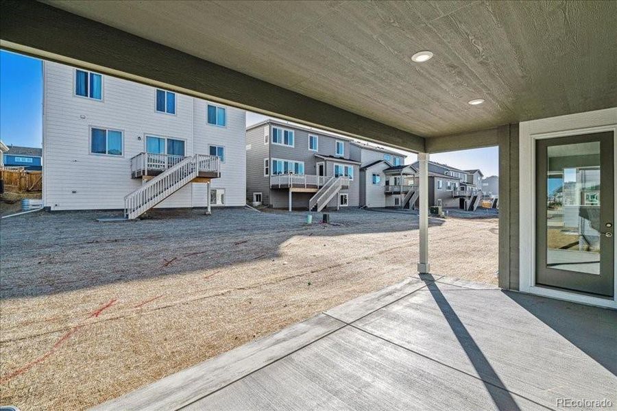 Exterior details and patio area of a home in Floret Collection at Alder Creek, Parker (Image 2).