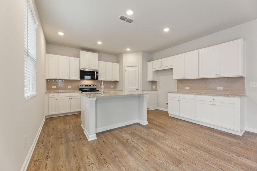 Furnished interior view inside a new home in Belleview Manor, Fairburn (Image 7).