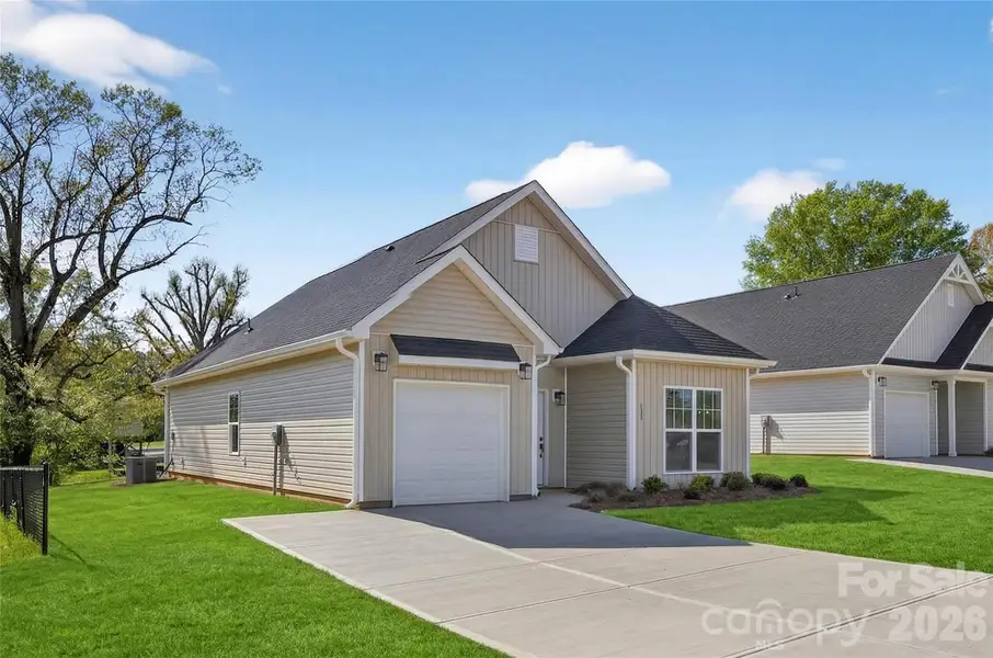 Front exterior of a new home in , Kannapolis, NC, highlighting curb appeal (Image 24). Front exterior of a new home in , Kannapolis, NC, highlighting curb appeal (Image 24).