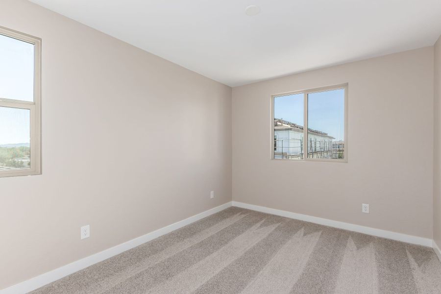 Spacious, unfurnished interior of a new home in Solvida at Estrella, Goodyear (Image 22).