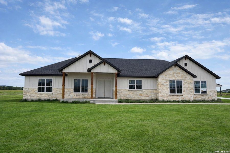 Front exterior of a new home in Pradera Ridge, Floresville, TX, highlighting curb appeal (Image 1). Front exterior of a new home in Pradera Ridge, Floresville, TX, highlighting curb appeal (Image 1).