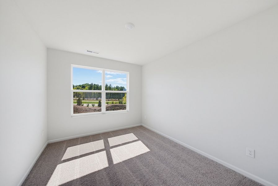 Spacious, unfurnished interior of a new home in Sweetbrier, Durham (Image 26).
