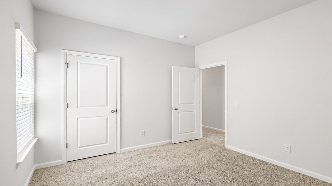 Spacious, unfurnished interior of a new home in The Crossing at St. James, Summerville (Image 24).