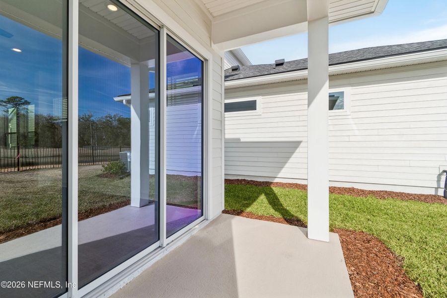 Exterior details and patio area of a home in Granville at eTown 38', Jacksonville (Image 2). Exterior details and patio area of a home in Granville at eTown 38', Jacksonville (Image 2).