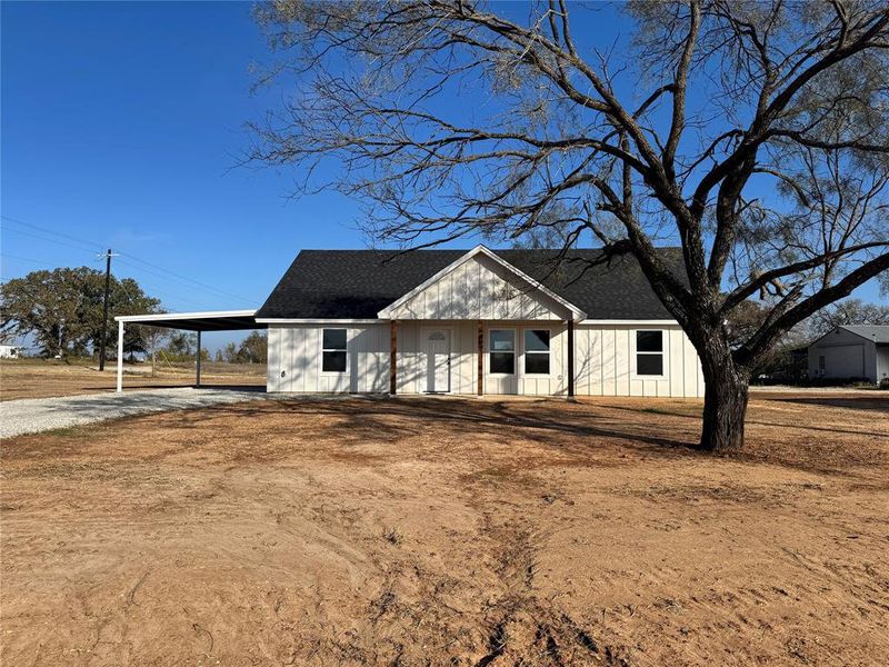 Front exterior of a new home in , Poolville, TX, highlighting curb appeal (Image 1). Front exterior of a new home in , Poolville, TX, highlighting curb appeal (Image 1).